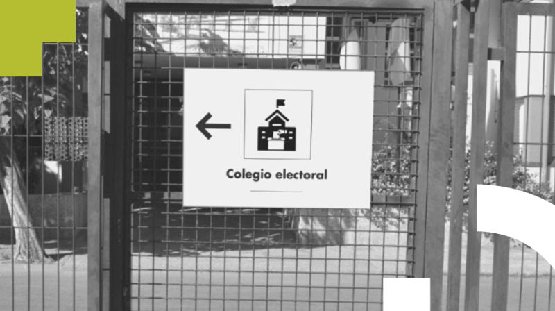 Imagen noticia Foto en blanco y negro de u cartel en el que se lee "colegio electoral" y un pictograma